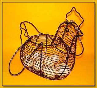 "Speckled Paper Mache Eggs in a Wire Hen Basket" by Tammy Wilson