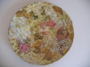 collage on a papermache plate by Ruth Gal
