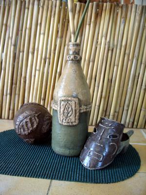 "RUSTIC MASK, Bottle and ball" by Arnold Barredo