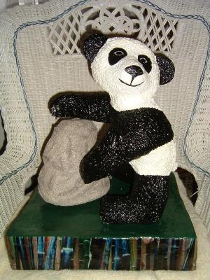 "Panda Touching Boulder On  A Bamboo Photo Base" by Carolyn Bispels