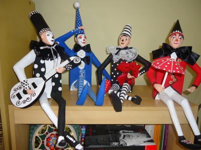 "HARLEQUINS IN BOOKCASE" by Rui Moura