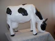 Grazing Cow by Cliff Powlowski