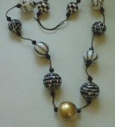 gilded and handpainted beads by Evangeline Duplessis