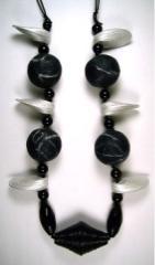 "papier mache and onyx necklace" by Evangeline Duplessis