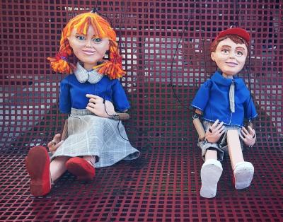 "Boy and Girl Marionette" by Eva Goldman