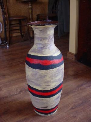 "vase with rings" by Linas Zymancius