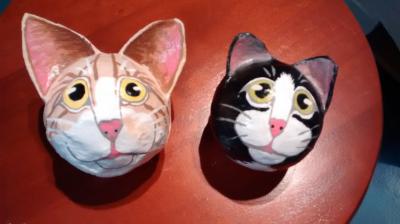 "Cat head Christmas balls" by Marilyn Kalbhenn