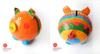 "Orange pig money box" by Efthimia Kotsanelou