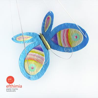 "Blue flying butterfly" by Efthimia Kotsanelou