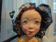 head of a doll (she has a body' too} by Tiva Noff